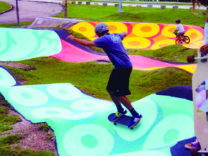 A volunteer from SBSX tests the track after painting.