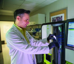 Dr. Rivero Vaccari in his lab