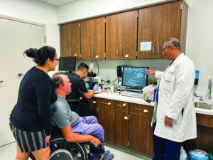 Dr. Ibrahim consults SCI patient about fertility